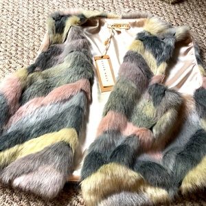 This is in perfect condition. Blush noir is on tags.